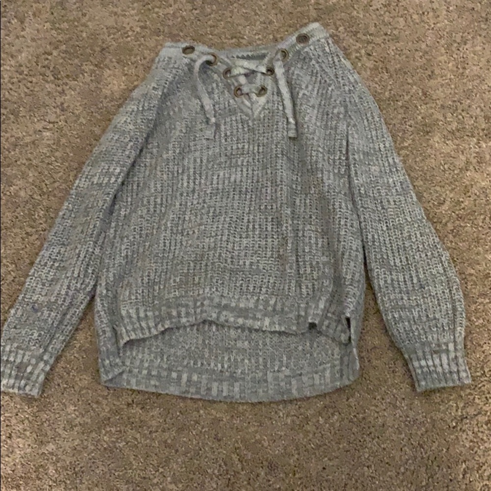A gray knitted sweater
